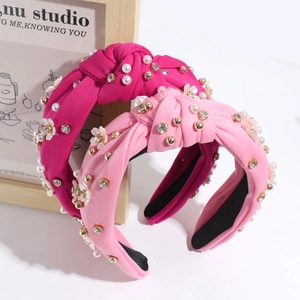 Vintage knotted headband with pearls and flowers in rose pink and light pink shades