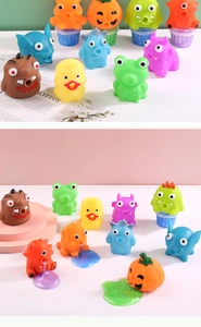 Macro detail of various colorful monster slime toys with gooey putty extrusion effect