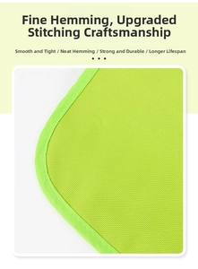 Detail of reinforced edge stitching and grid texture on green waterproof picnic mat