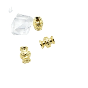 Golden vintage vase-shaped spacer beads with floral relief for DIY jewelry making