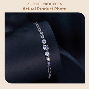 Macro view of double-layered S925 silver bracelet with seven sparkling moissanite stones