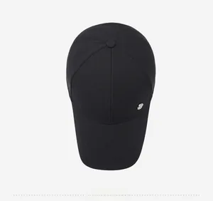Top view of a black baseball cap with six-panel design and silver metal decoration