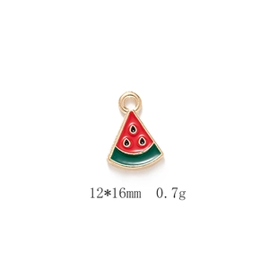 Detail of red watermelon fruit enamel charm with gold plating and dimensions 12x16mm