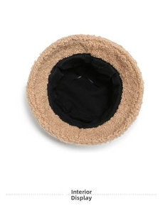 Detail view of winter lamb wool bucket hat interior with adjustable black drawstring
