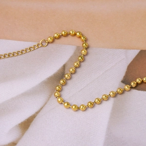 Minimalist gold ball chain bracelet in stainless steel with adjustable extender link