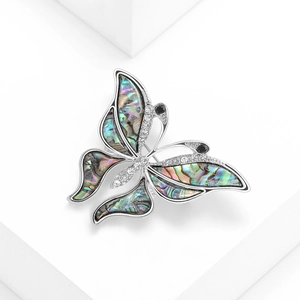 Elegant silver butterfly brooch with colorful abalone shell wings and sparkling rhinestones