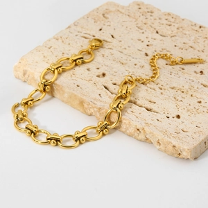Gold plated stainless steel U-link chain bracelet with zircon accents on beige stone