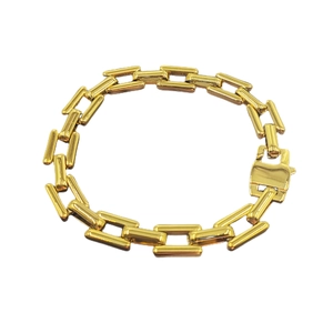 Polished gold square link chain bracelet with a square clasp for a trendy punk aesthetic