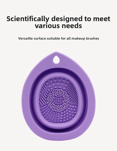 Macro view of purple silicone makeup brush cleaner with diverse textured washing zones