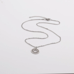 Detail of silver titanium steel necklace featuring a hollow heart pendant for Mother's Day