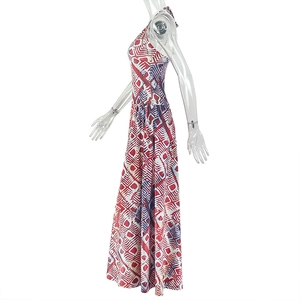 Detail of red and blue geometric print on a halter neck long dress for women