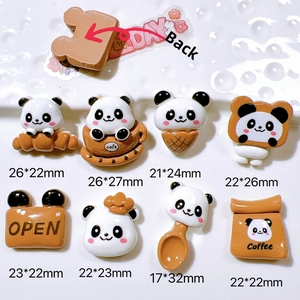 Macro detail of cartoon panda resin charms for DIY crafts with size measurements