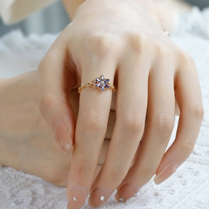 Detailed macro view of the vintage snowflake ring with blue marquise cut gems