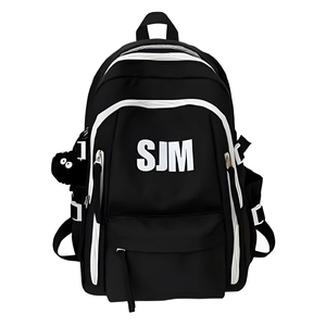 Retro black and white school backpack with SJM logo and fuzzy soot sprite pendant charm
