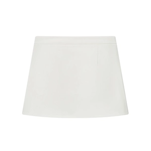 Detail of a white A-line mini skirt showing high-quality plain weave fabric and stitching