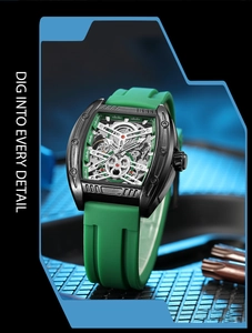 Macro shot of mechanical watch dial with black tonneau case and green silicone strap