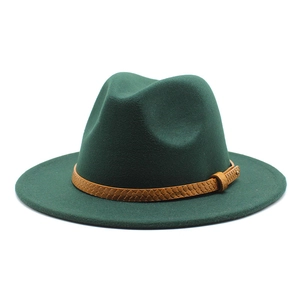 Macro view of dark green wool felt jazz hat with textured faux snakeskin leather band