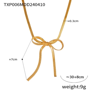 Dettagli della collana con fiocco dorato, lunghezza 30+8 cm e peso di circa 9 grammi