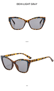 Detailed front and side view of cat eye sunglasses in demi frame with light gray lenses