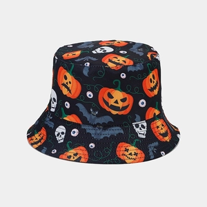 Detail of Halloween bucket hat with pumpkin, skull, and bat prints on black fabric