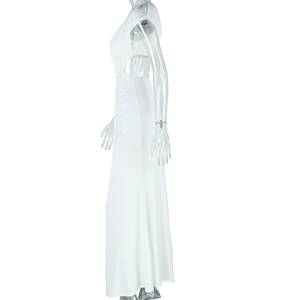 Close-up of white side-cutout dress with waist ruching on a side-view mannequin