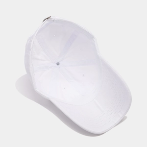 Detail view of cotton baseball cap interior with stitching and bronze metal buckle