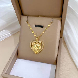 Luxury gold heart pendant necklace with crystal stones and a roaring tiger head design