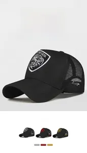 Detail of lion shield embroidery on breathable mesh trucker hat with curved visor
