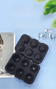 Detail of 6-cavity black silicone ice ball mold with food-grade material certification