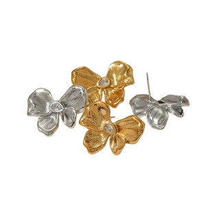 Elegant butterfly zircon earrings in gold and silver finish with teardrop stones
