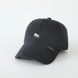 Detail of black cotton kids baseball cap featuring white fox embroidery and curved brim
