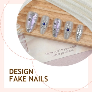 Short almond press-on nails with silver liquid metal aurora finish and blue rhinestones
