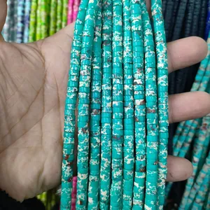 Macro view of blue-green marble textured spacer beads for DIY jewelry making