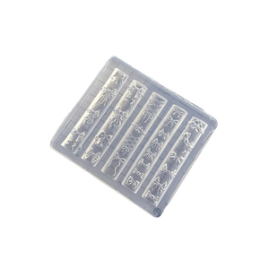 Transparent silicone nail art mold featuring various 3D bow patterns for DIY designs