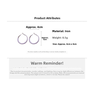 Detail of lavender purple iron hoop earrings with silver pins and 4cm diameter dimensions