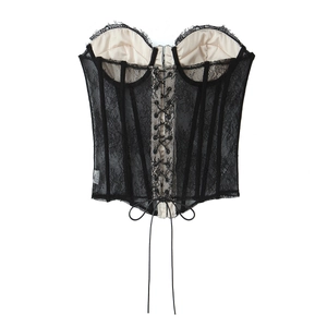 Lace bustier corset top with beige lining, featuring front tie-up and mesh details