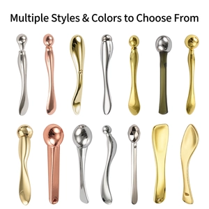 Zinc alloy facial massage tools and eye cream spoons in silver, gold, and rose gold