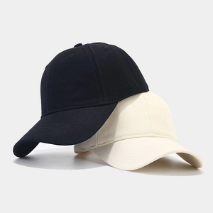 Minimalist soft top cotton baseball caps in black and beige with a curved brim design