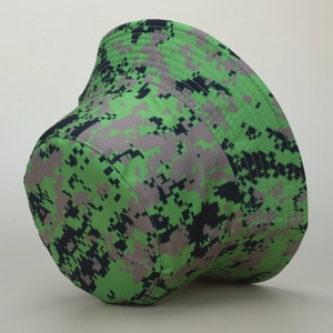 Detail of digital camouflage sun hat with pixelated green and blue pattern and wide brim