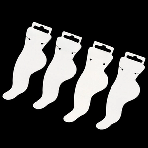 Close-up of four white foot-shaped jewelry display cards for stainless steel anklets