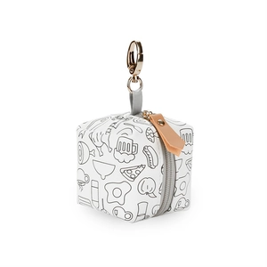Detail of waterproof pacifier bag with food doodles and golden carabiner clip