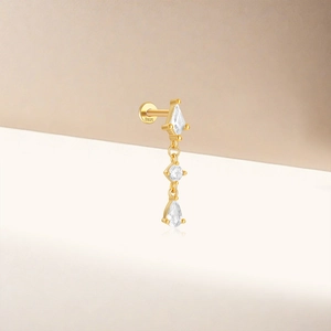 Detailed view of S925 sterling silver gold earring with sparkling tassel charms