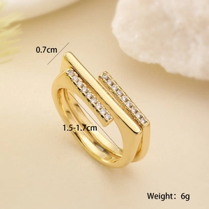 Detailed view of gold layered ring with double zircon rows and dimensions showing 0.7cm width