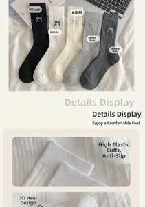 Detailed view of 5-color ribbed knit socks featuring elastic cuffs and cotton blend texture