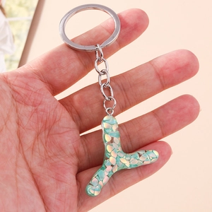 Handheld resin alphabet keychain with sparkling blue and green sequins and silver metal ring