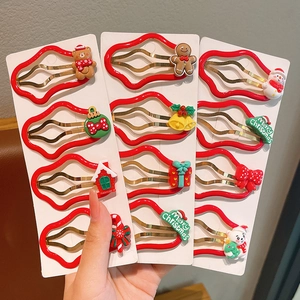 Christmas hair clips set with red festive bear, gingerbread man, and snowman patterns