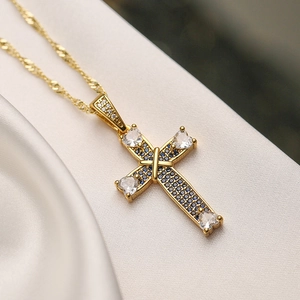 18K gold-plated cross necklace with blue zircon and heart-shaped crystals on silk