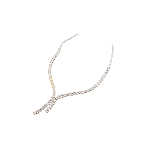 Silver layered tassel necklace with sparkling zircon crystals on a clean white background