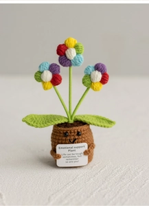 Knitted emotional support plant with colorful flowers and positive quote card