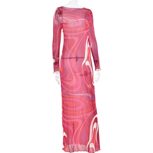 Detail of pink and red wave print mesh fabric on a long sleeve bodycon maxi dress
